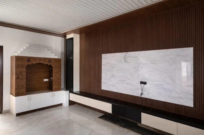 Elegant wooden wall paneling and false ceiling design for residential interiors